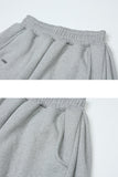 [mnem] pintuck fleece logo jogger pants