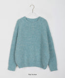 Temped boucle wool round knit