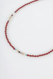 down red gemstone necklace