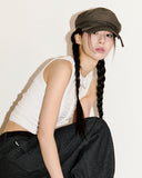 Shelby string newsboy cap