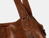 Griffin Leather Multi-Pocket Shoulder Bag
