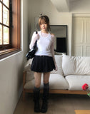 Noki Striped Pleated Mini Skirt