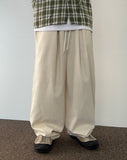 Golden pleated balloon banding pants