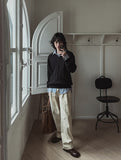 Rich cable V-neck knitwear