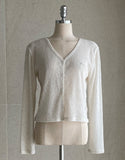Kiet V-neck pendant knit cardigan