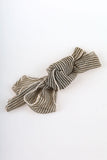 Wave shirring muffler