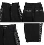 Heron embroidered denim pants