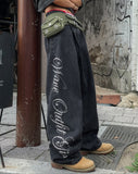 Hotfix side lettering unbalance denim pants