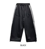 Solid track line two way training pants