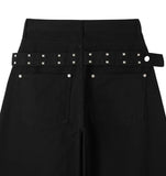 Pale studded strap pants