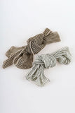 Wave shirring muffler