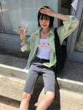 BUTTON CAPRI PANTS