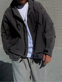 Protrusion Pocket Hood Windbreaker