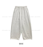 Oat herringbone side pintuck balloon pants
