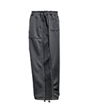 Solid track line two way training pants