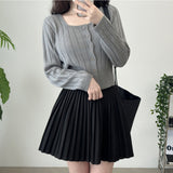 Pleated Wool Mini Skirt