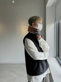 Coil collar open vest