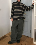 STRIPED FLEECE MOCK-NECK TOP