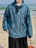 Double Pleats High-Neck S/S Blue Jacket