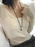 Bru sleeveless layered see-through ribbed long sleeve knit