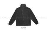 DIAGONAL HIGH-NECK ZIP-UP