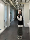 Coil collar open vest