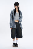 Beat over nerd check shirt
