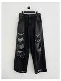 Ripped vintage damage black denim