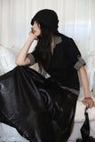 Bold Leather Pleated Skirt