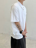 Coil collar open vest