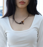 Choco ball wood necklace
