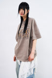 Curse many cross pigment over T-shirt