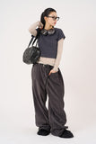 Padded glossy leather shoulder bag