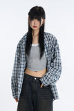 Beat over nerd check shirt