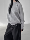 Slit semi-polar button knit