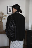 Calin padded two-way bag