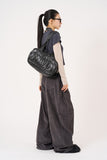 Padded glossy leather shoulder bag