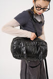 Padded glossy leather shoulder bag