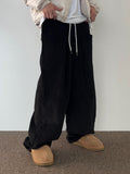 Golden pleated balloon banding pants