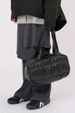 Padded glossy leather shoulder bag