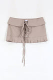 Pleated layered snap skirt