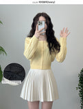 Pleated Wool Mini Skirt