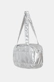Padded glossy leather shoulder bag