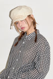 Shelby string newsboy cap