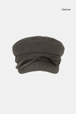 Shelby string newsboy cap