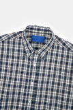 Beat over nerd check shirt
