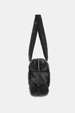 Padded glossy leather shoulder bag
