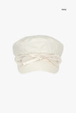 Shelby string newsboy cap