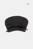 Shelby string newsboy cap