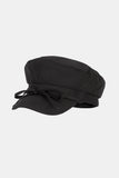 Shelby string newsboy cap